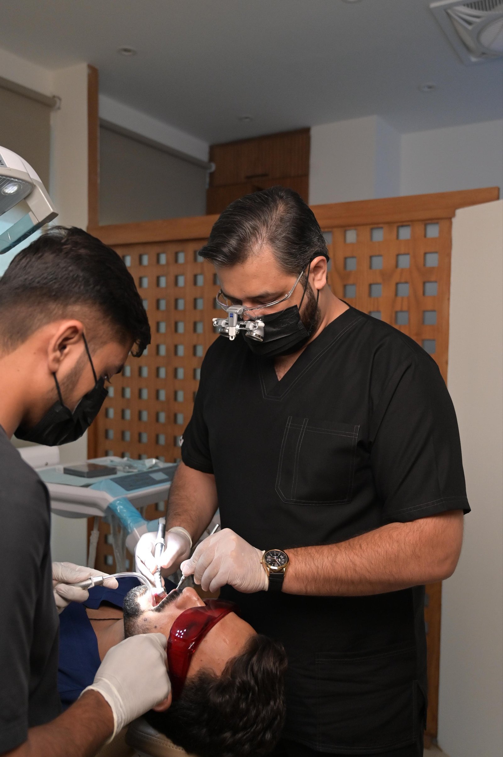 Patient receiving professional teeth whitening treatment at Smile And Skin Co.